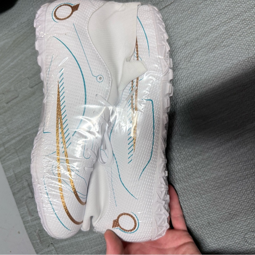 White soccer with Gold and Blue Accents